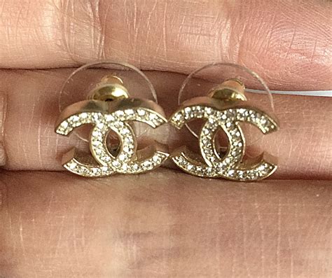 chanel logo stud earrings fake|chanel cc logo earrings.